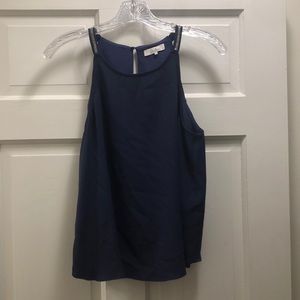 Parker. Dark blue sleeveless top. Silk. Chain detail on straps.